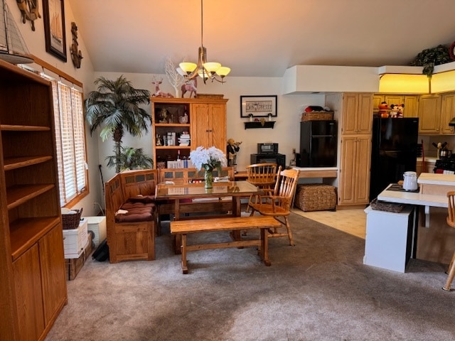 carpeted dining area featuring a chandelier and vaulted ceiling