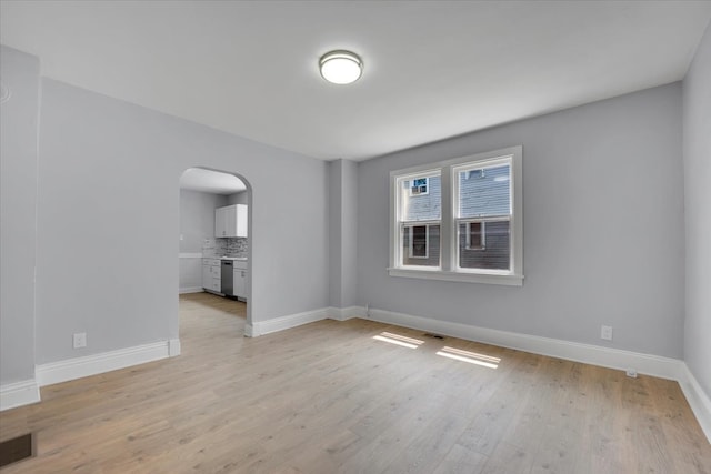 unfurnished living room with light hardwood / wood-style floors