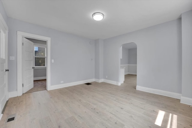 unfurnished room featuring light wood-type flooring