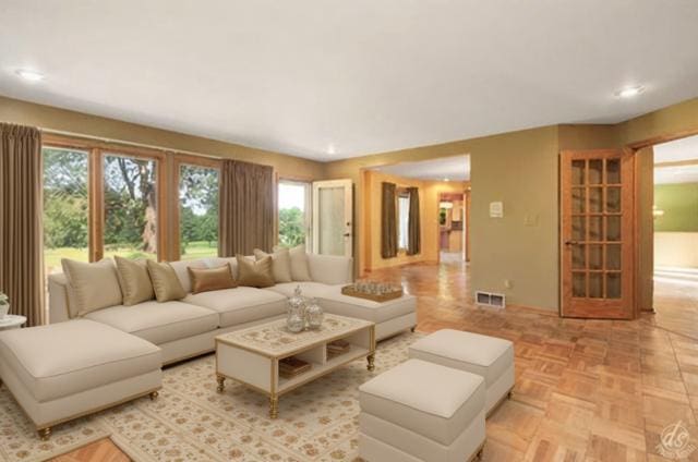 living room featuring light parquet floors