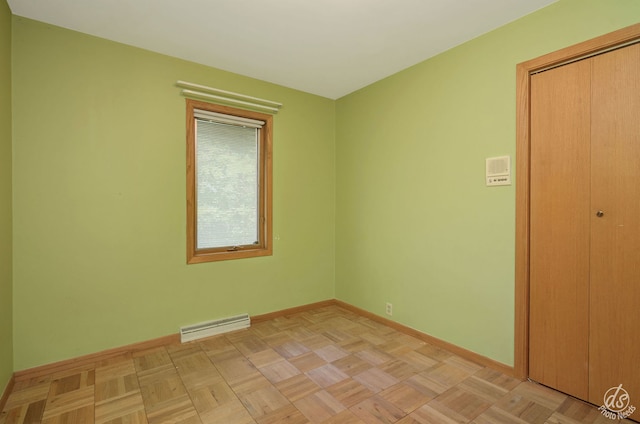 spare room with light parquet flooring