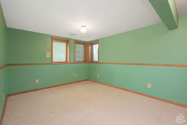 view of carpeted spare room