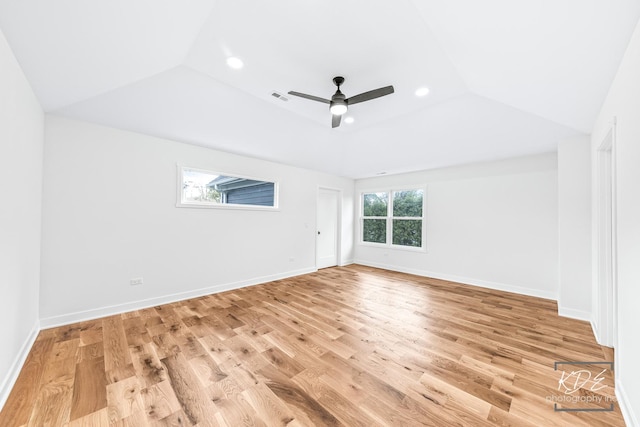 interior space featuring visible vents, recessed lighting, light wood-style flooring, and lofted ceiling