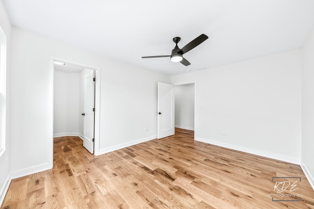 unfurnished bedroom with baseboards, light wood-style flooring, and ceiling fan