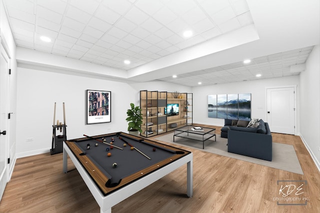 recreation room with baseboards, wood finished floors, and pool table