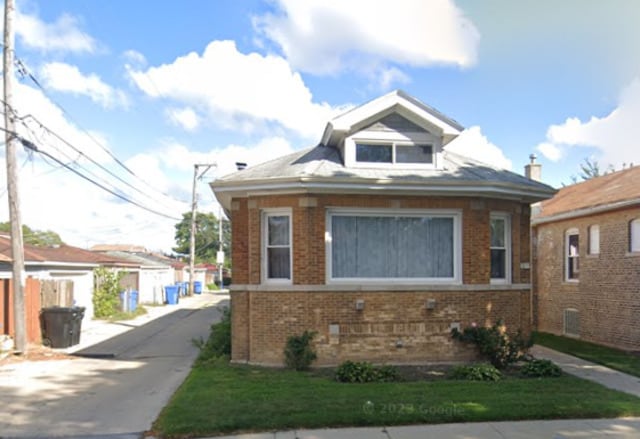 8315 S Dante Ave, Chicago, IL 60619 - bungalow-style home featuring brick siding and fence
