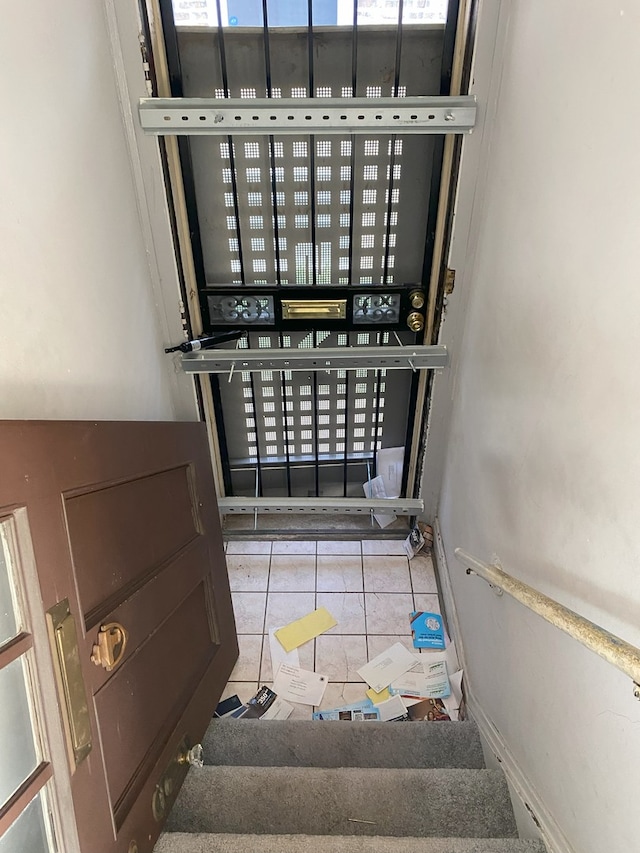 8315 S Dante Ave, Chicago, IL 60619 - stairs featuring tile patterned flooring