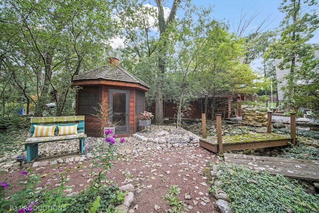 view of yard featuring an outbuilding and a gazebo