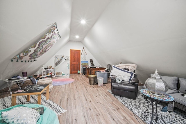 bonus room with lofted ceiling, wood finished floors, and recessed lighting