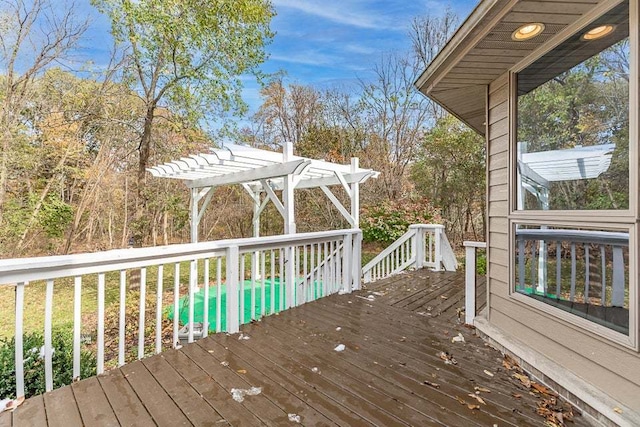 wooden deck with a pergola