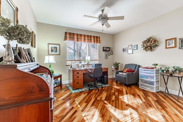 office area with ceiling fan and hardwood / wood-style flooring