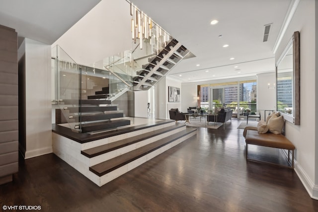 stairway with hardwood / wood-style flooring