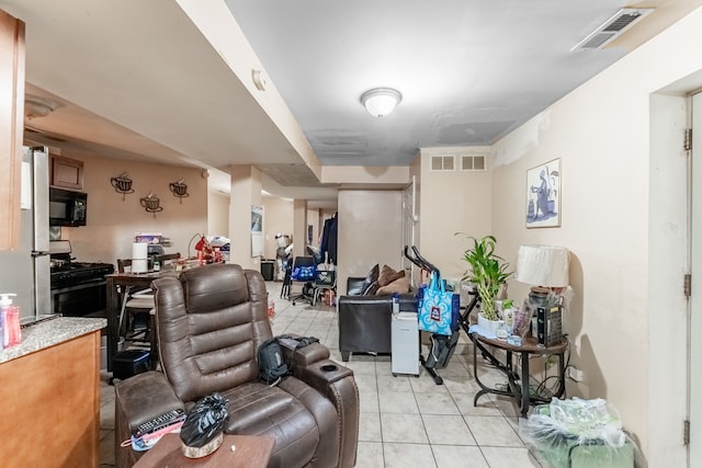 living room featuring light tile patterned flooring