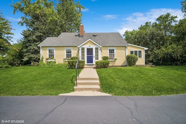 view of front of home with a front lawn