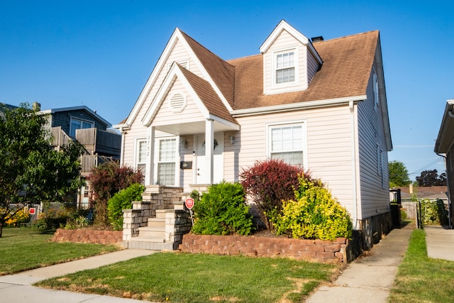 view of front of home with a front yard