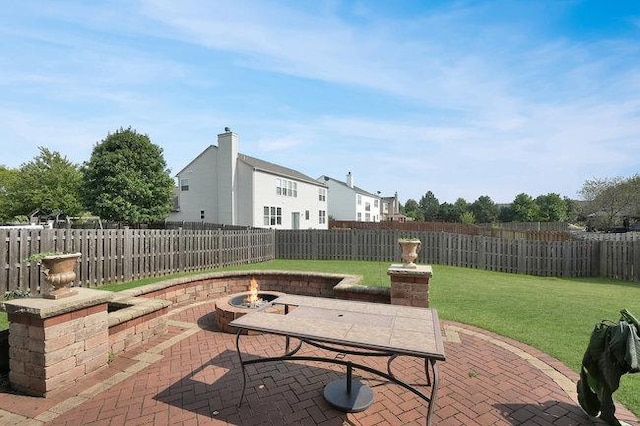 view of patio / terrace featuring a fire pit