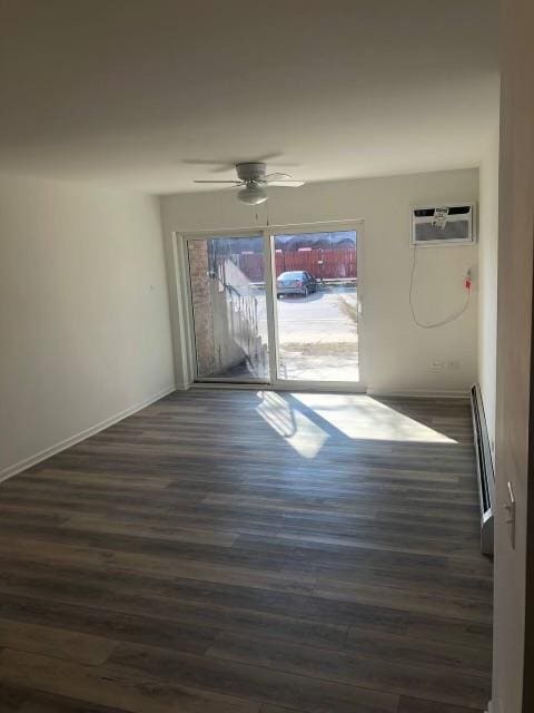 empty room featuring wood-type flooring and a wealth of natural light