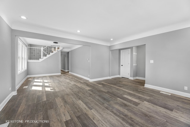 unfurnished living room featuring hardwood / wood-style floors