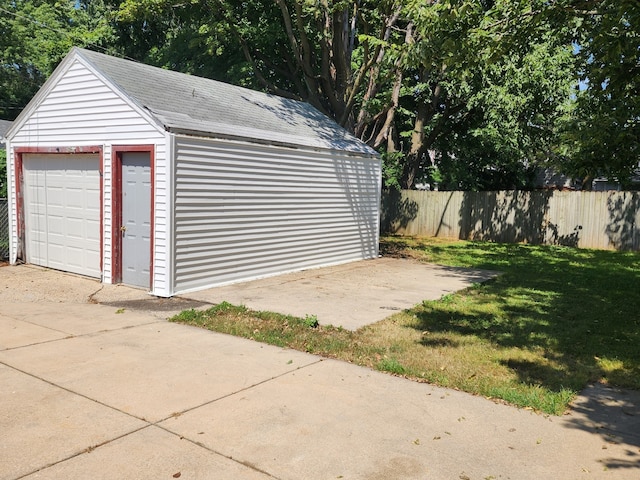 garage with a lawn