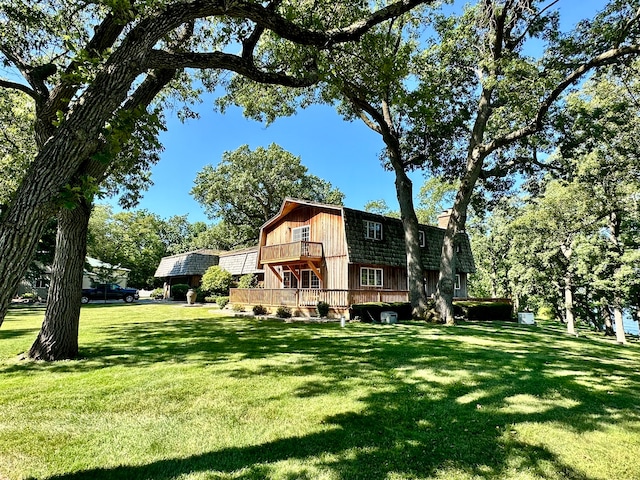 back of house with a yard