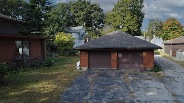 garage with a lawn