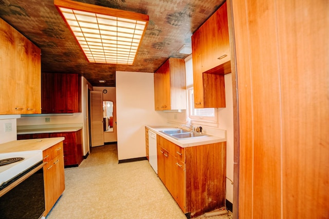 328 E Mulberry St, Watseka, IL 60970 - kitchen featuring a sink, white appliances, light countertops, light carpet, and baseboards