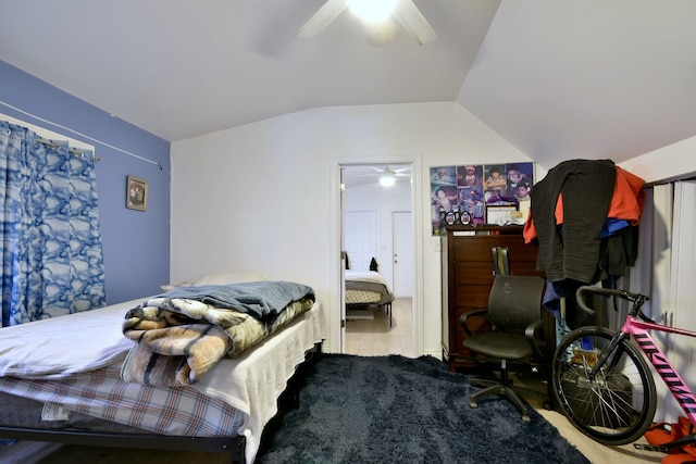 bedroom featuring ceiling fan, vaulted ceiling, and hardwood / wood-style flooring