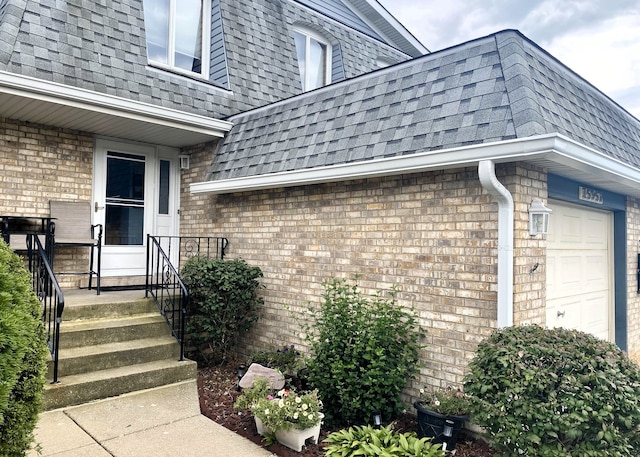 entrance to property with a garage