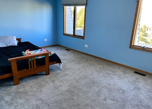 bedroom featuring carpet