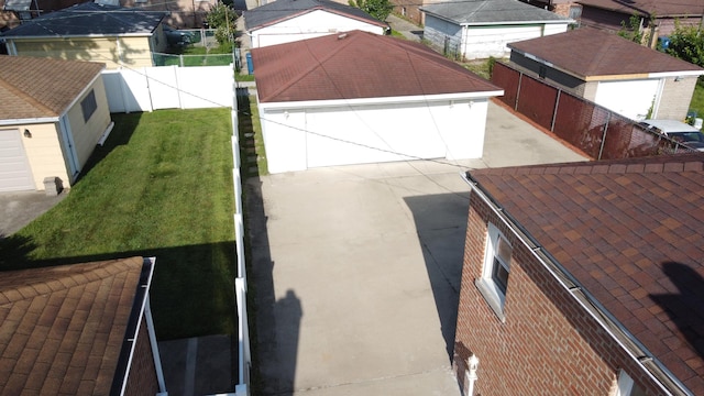 birds eye view of property with a residential view