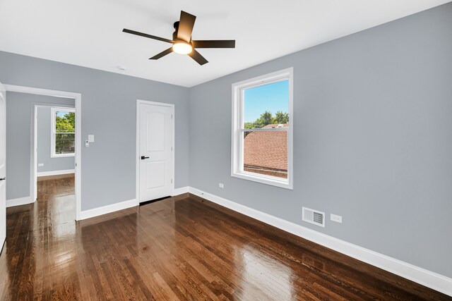 unfurnished room featuring ceiling fan and wood-type flooring