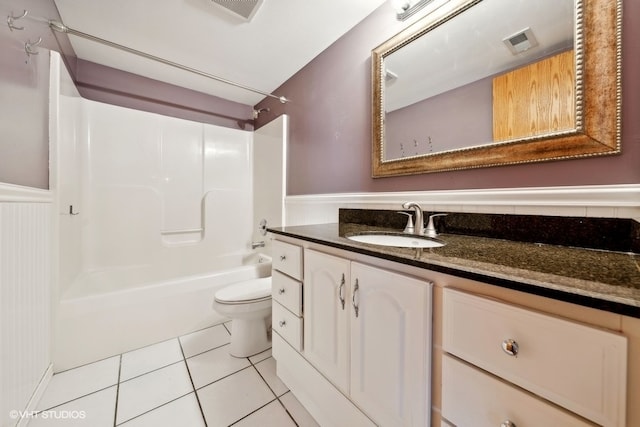 full bathroom featuring  shower combination, toilet, vanity, and tile patterned flooring