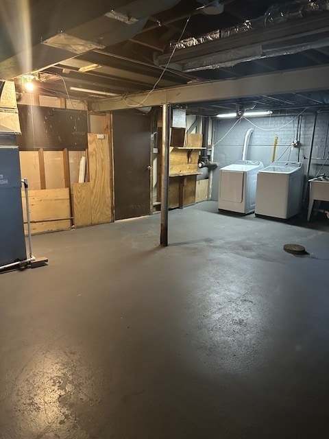 basement featuring separate washer and dryer