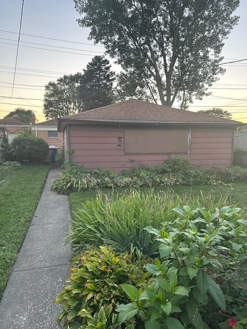 view of property exterior at dusk