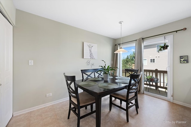 dining room featuring light tile patterned flooring