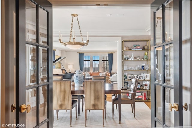 dining space featuring ornamental molding