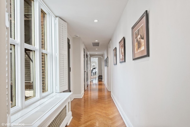 hall with light parquet flooring