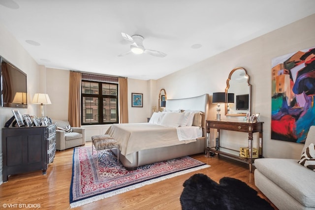 bedroom featuring ceiling fan and light wood-type flooring