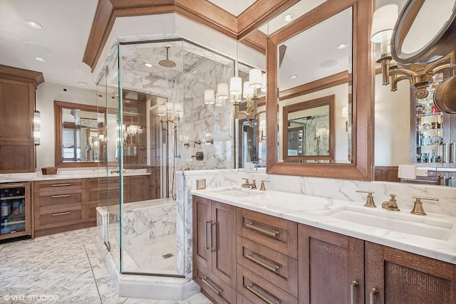 bathroom with vanity, beverage cooler, and a shower with shower door