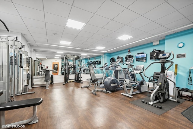 gym with hardwood / wood-style floors