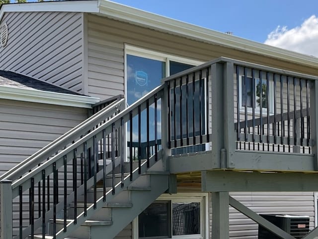 view of property exterior with cooling unit