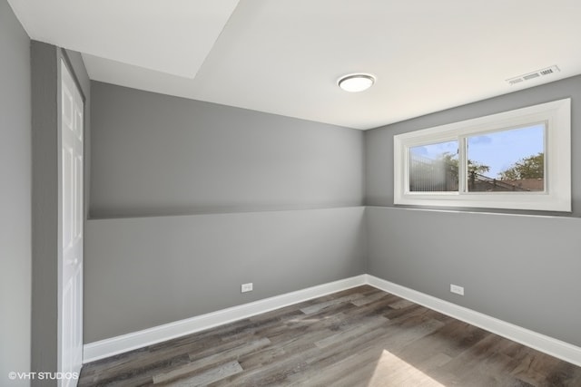 empty room featuring wood-type flooring