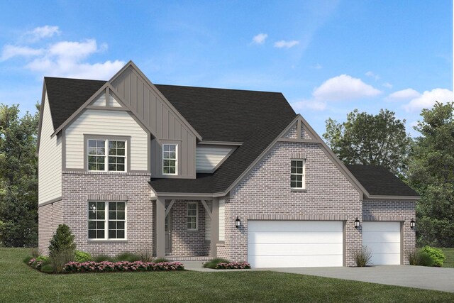 view of property with a front yard and a garage