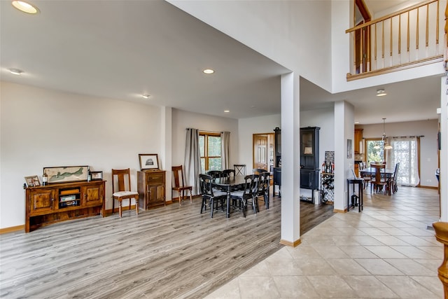 interior space with light wood-type flooring and a wealth of natural light