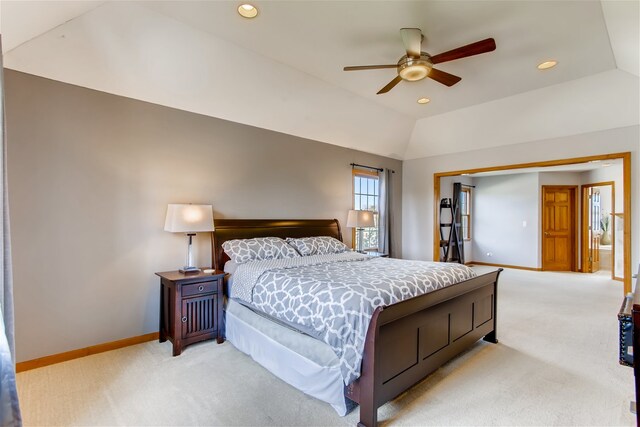 carpeted bedroom with lofted ceiling and ceiling fan