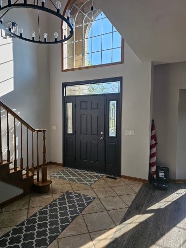 foyer entrance with a high ceiling