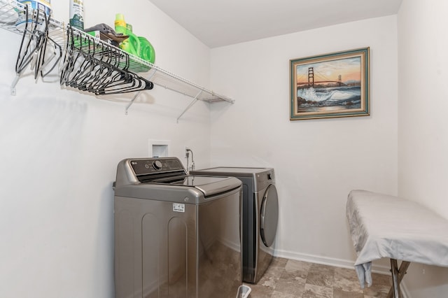 laundry area featuring independent washer and dryer