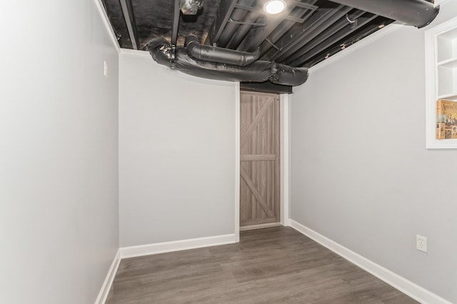 empty room with hardwood / wood-style floors