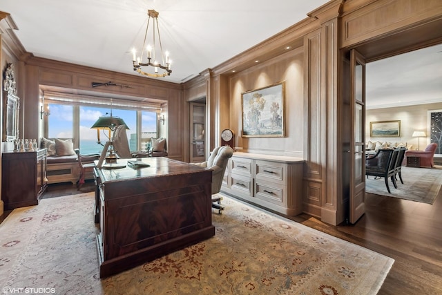 office area featuring ornamental molding, dark hardwood / wood-style flooring, and a chandelier