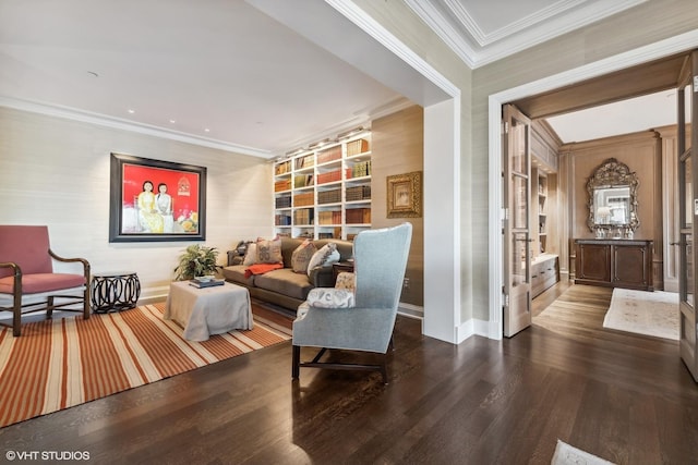 sitting room featuring hardwood / wood-style flooring and ornamental molding